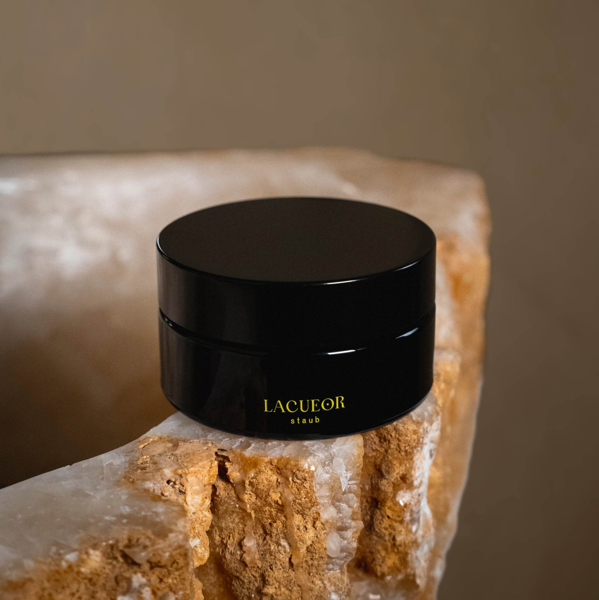 LACUEOR Staub luxury skincare product on crystal
